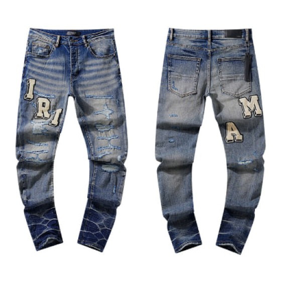 Light Blue Washed Denim Jeans with Beige AMIRI Letter Patches and Crocodile Print Details